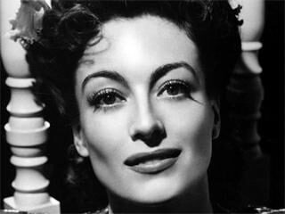 Joan Crawford Quote “Love is a fire”